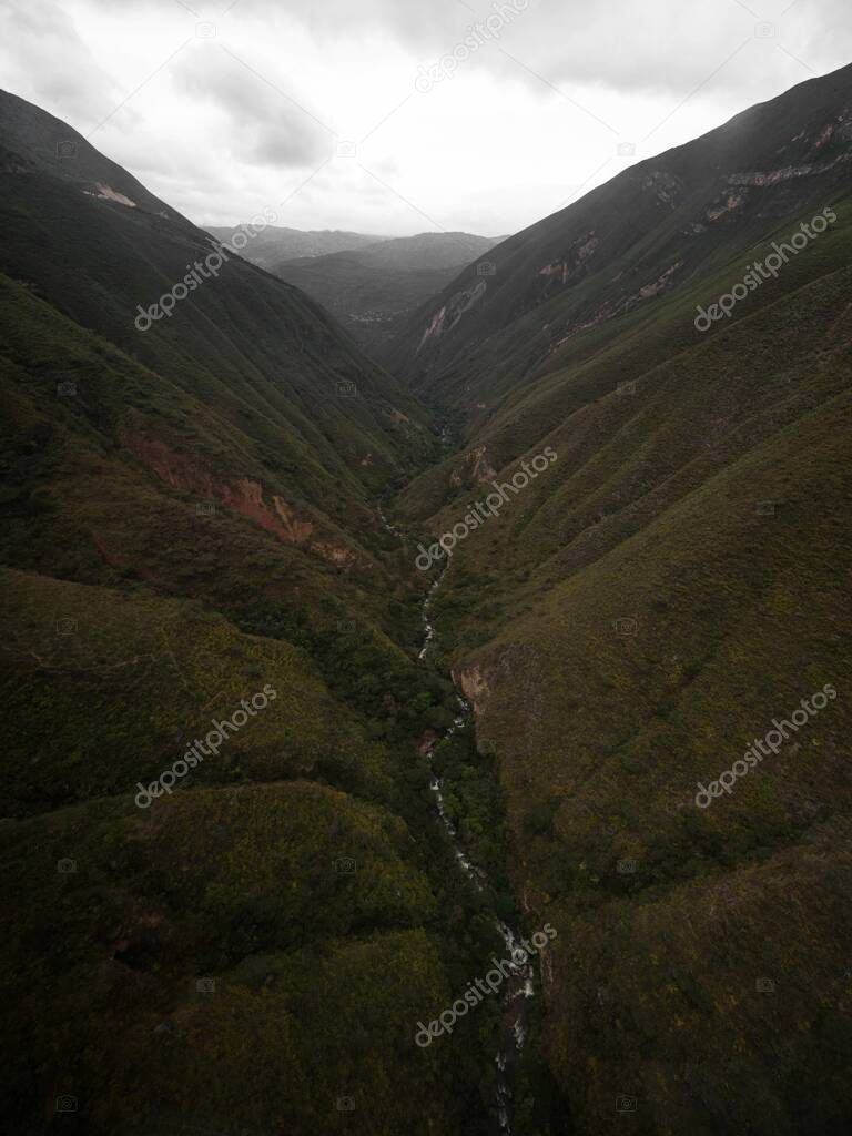 Panorama view of massive green canyon river gorge hills mountains Kuelap cable car Chachapoyas Amazon Northern Peru