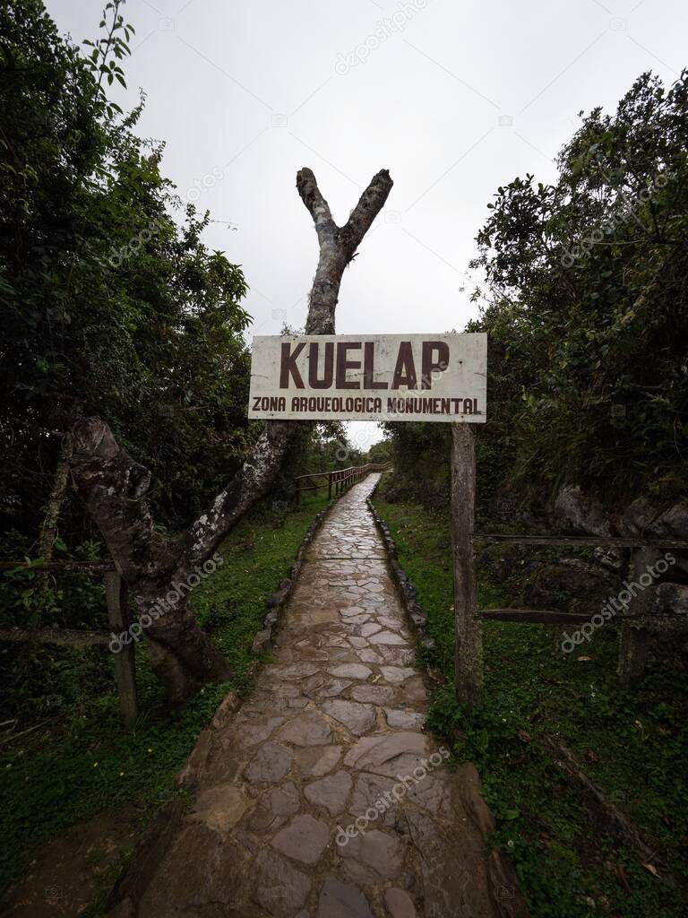 Entrance welcome sign name letter of Kuelap archaeological monument ancient citadel ruins andes cloud Amazonas Peru