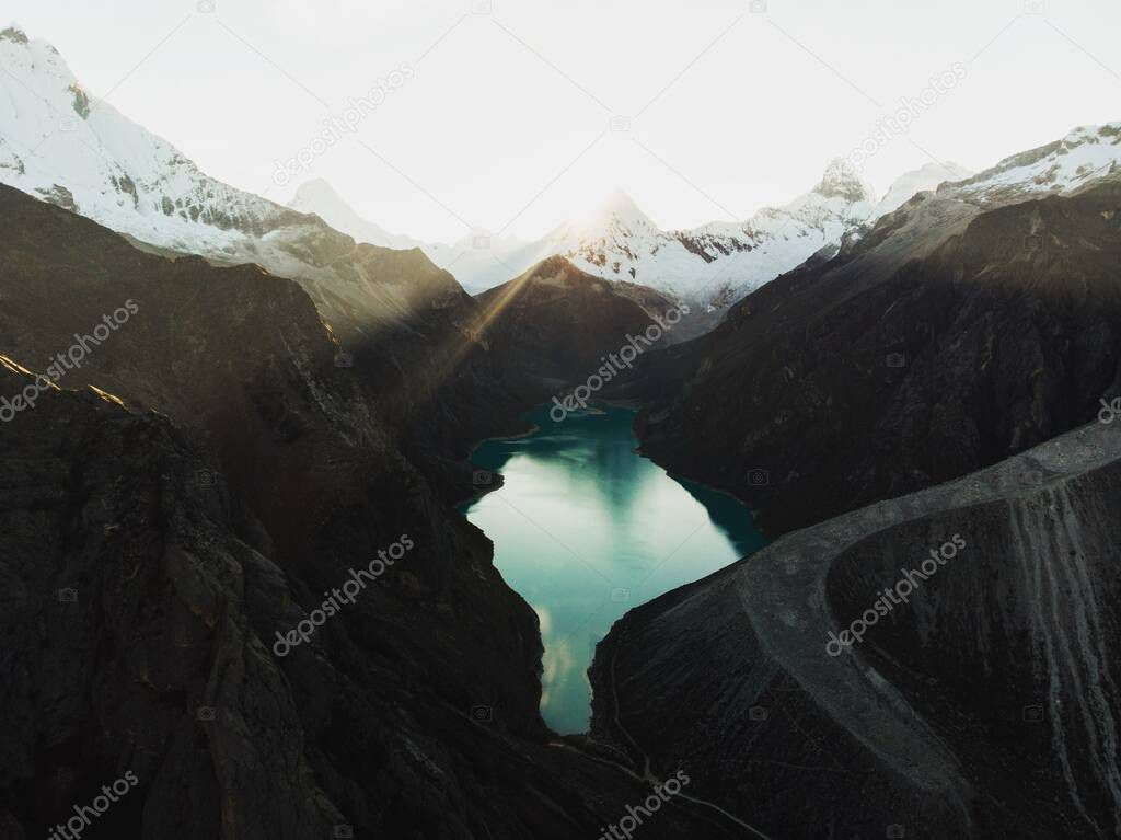 Aerial panorama of blue turquoise alpine mountain lake Laguna Paron in Caraz Huaraz Ancash Cordillera Blanca Peru