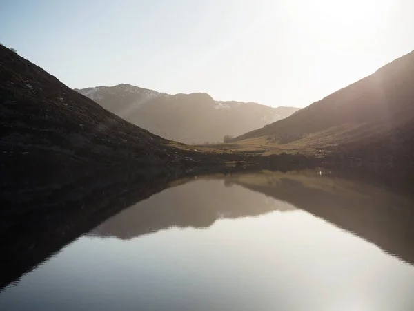 파노라마의 반사 사진 Lago de Enol pine lakes of Covadonga Picos de Europa Asturias Spain Europe — 스톡 사진