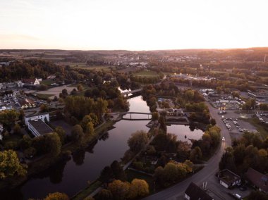 Aerial sunset panorama view near medieval fortress castle Schloss Sigmaringen at Danube river in Tuebingen Baden-Wuerttemberg Germany Europe