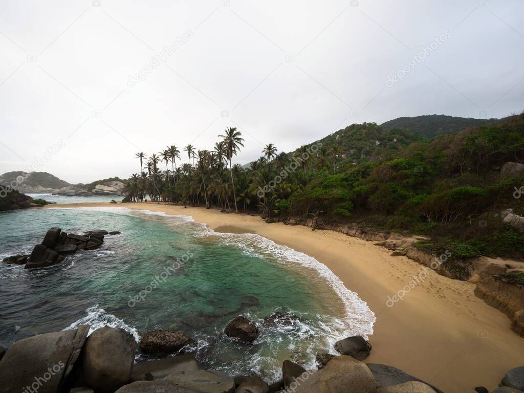 Aerial panorama view of Cabo San Juan del Guia in Tayrona National Park tropical Caribbean coast palm sand beach Colombia South America