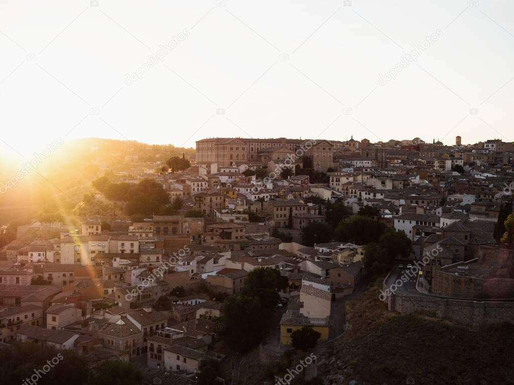 Aerial sunset panorama view of historic medieval architecture Toledo cityscape skyline at Tagus river in Castilla La Mancha Spain Europe