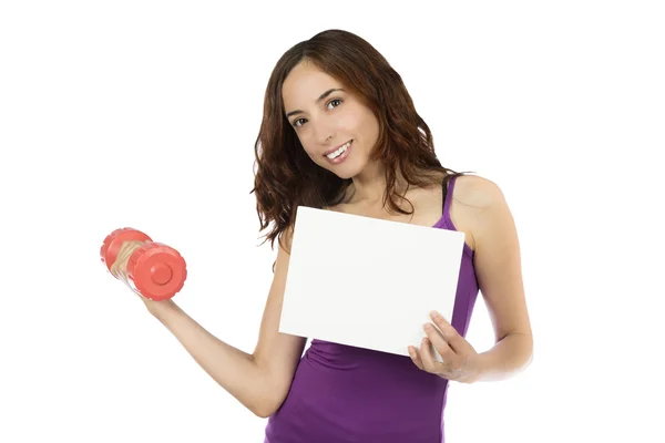 Mulher fitness jovem com um cartão de sinal em branco — Fotografia de Stock