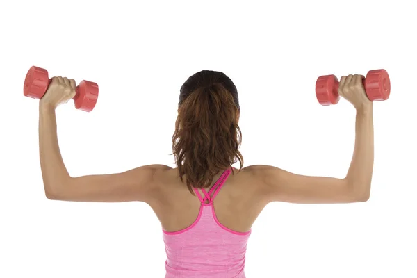 Güçlü kadın vücut geliştirme dumbbells ile uyum — Stok fotoğraf