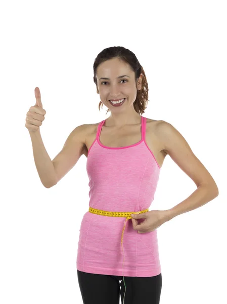 Felice in forma donna perdita di peso pollice su — Foto Stock