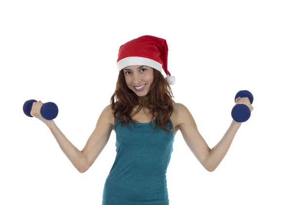 Christmas fitness woman lifting weights — Stock Photo, Image