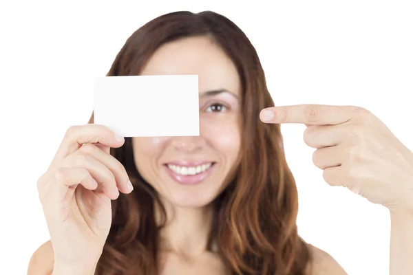 Young woman showing an empty white sign card — Stock Photo, Image