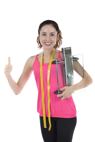 Woman successful in weight loss holding a glass scale — Stock Photo, Image