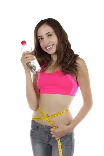 Young weight loss woman with a water bottle Stock Photo