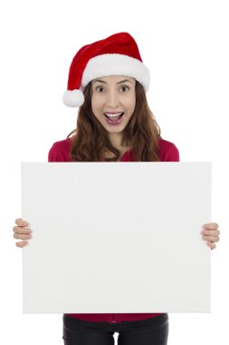 Bir reklam panosu sürpriz gösterilen Santa kadın heyecanlı