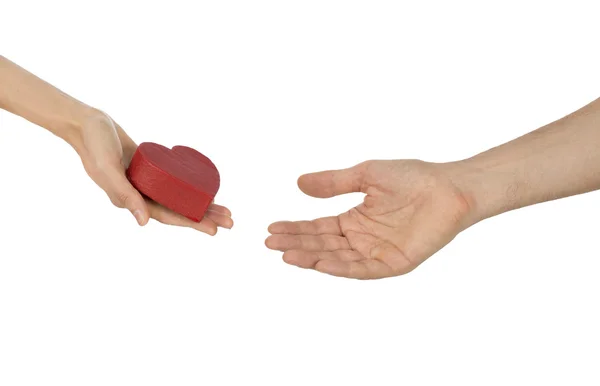 Lovers hands reaching a heart — Stock Photo, Image