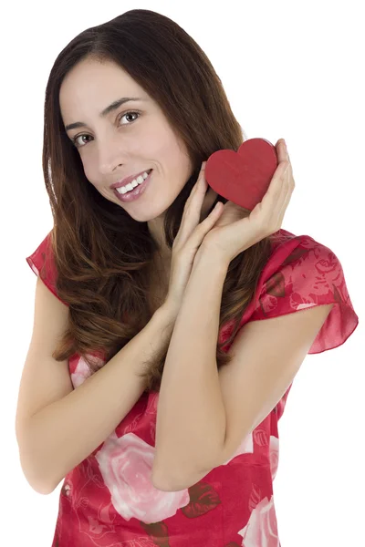 Smiling attractive woman with a red heart Stock Picture