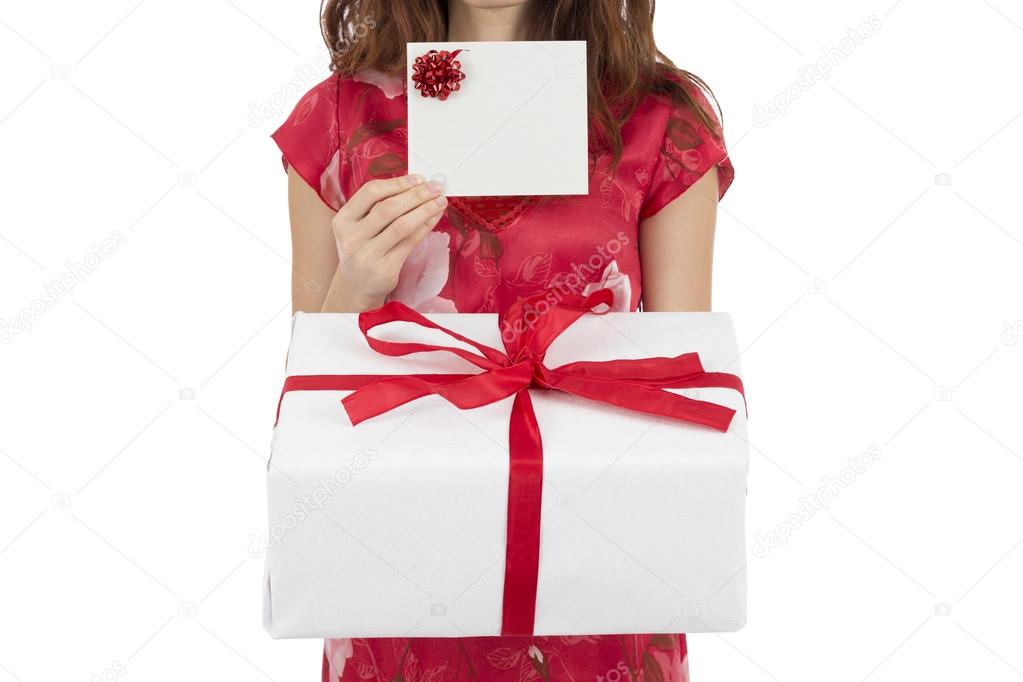 Woman showing gift card and gift box