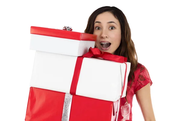 Woman holding gift boxes with excitement — Stock Photo, Image