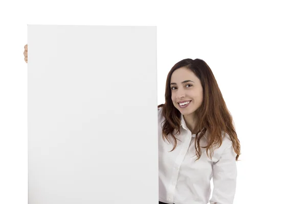 Vrouw toont een leeg reclamebord — Stockfoto