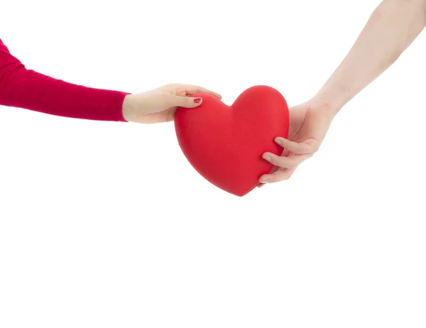 Hands reaching for heart — Stock Photo, Image