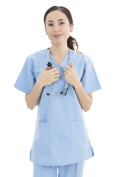 Woman nurse or medical doctor standing and holding stethoscope — Stock Photo, Image