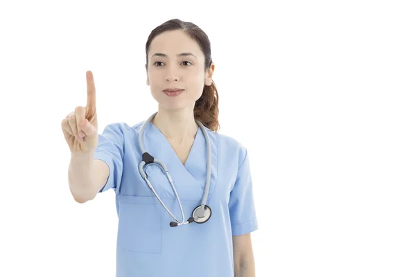 Female nurse or doctor pushing a button — Stock Photo, Image