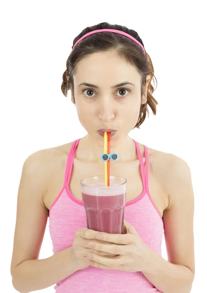 Woman drinking delicious strawberry smoothie — Stock Photo, Image