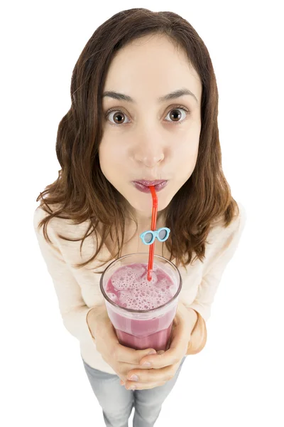 Menina engraçada beber smoothie Imagem De Stock