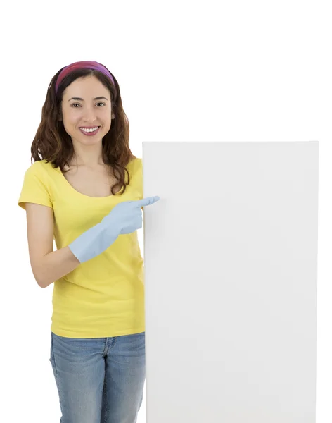 Mulher de limpeza apresentando um cartaz de publicidade — Fotografia de Stock