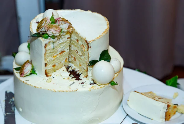 Tiered cake for wedding or birthday. Traditional wedding cake.