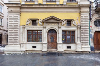25.02. 2021 City of Lviv, Ukraine, Rynok Square. Original authentic doors on the outskirts of Rynok Square in Lviv. Authentic architecture of the city of Lviv. Doors of the city of Lviv. 
