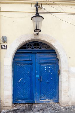 25.02. 2021 City of Lviv, Ukraine, Rynok Square. Original authentic doors on the outskirts of Rynok Square in Lviv. Authentic architecture of the city of Lviv. Doors of the city of Lviv.