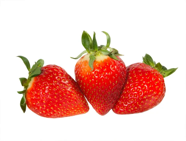 Три ягоды клубники — стоковое фото