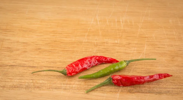 Three hot peppers — Stock Photo, Image