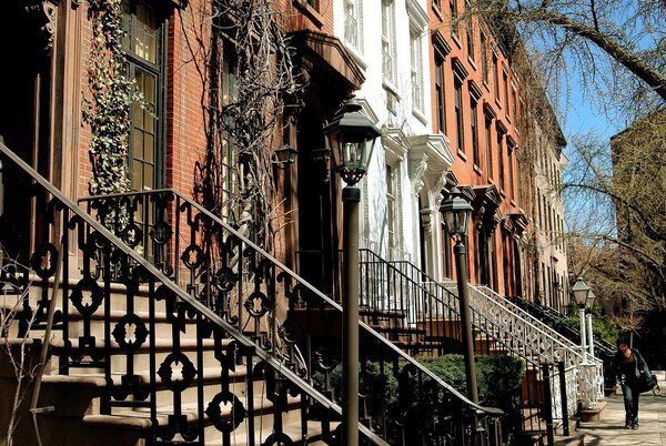 New York City - May 10, 2005: Handsome 19th century Federal town houses with stoops on historic St. Luke's Place