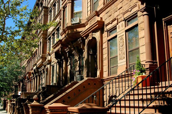 New York City - September 10, 2005: Classic early 20th century brownstones on West 121st Street in Harlem