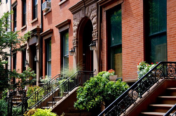 Brooklyn, NY: Elegant late 19th century brick town houses with stoops and front gardens in the Cobble Hill Historic District