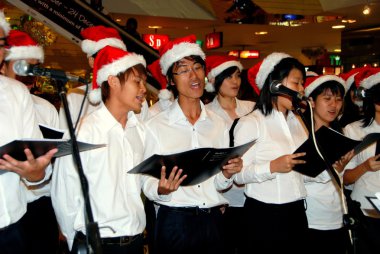 Singapore: Choir Singing Christmas Carols clipart
