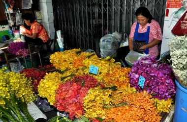 Bangkok, Tayland: Çiçek pazarı, satıcı