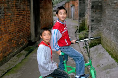 Pengzhou, China: Two Boys on a Bicycle