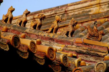 Beijing, China: Rooftop row of Zodiac Figures at Forbidden City clipart