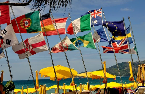 Phuket, Thailand: Flags Flying on Patong Beach — Stock Photo, Image