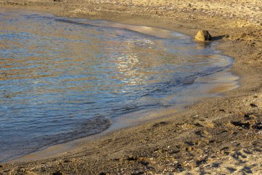 Atina 'da Anavyssos sahilinde gün batımı