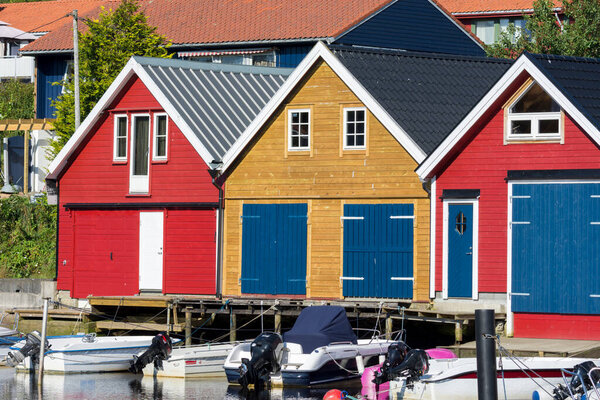 Colorful wooden houses on the sea in Osoyro in Norway