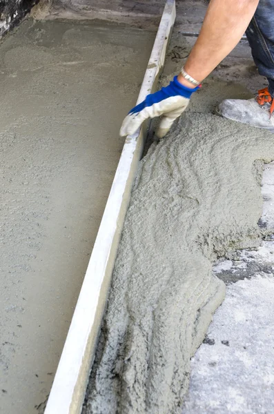 Rigone para alisar o concreto — Fotografia de Stock