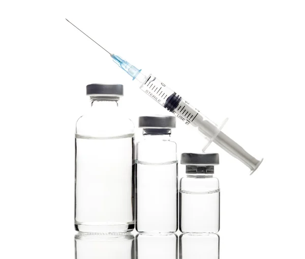 Glass Medicine Vials and Syringe on white background — Stock Photo, Image