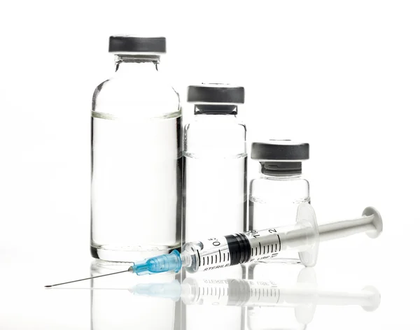 Glass Medicine Vials and Syringe on white background — Stock Photo, Image