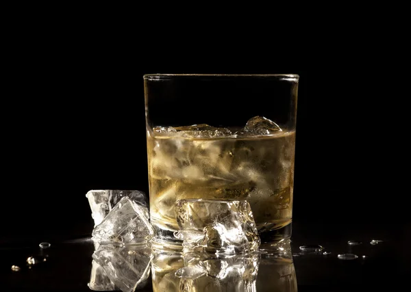 Whiskey on black background — Stock Photo, Image