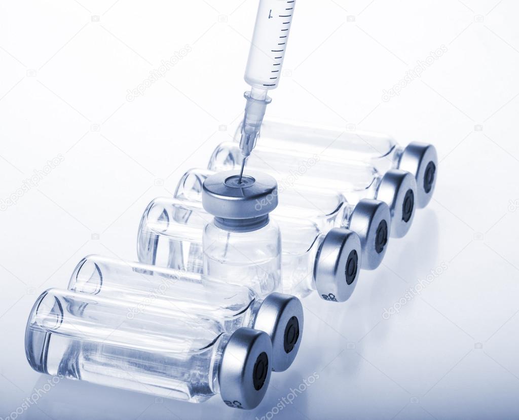 Vials and Syringe