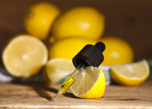 Lemon essential oil — Stock Photo, Image