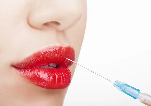 Woman with syringe — Stock Photo, Image