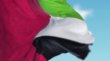 Rüzgârda BAE bayrağı sallamak. Birleşik Arap Emirlikleri Bayraksız Döngü.