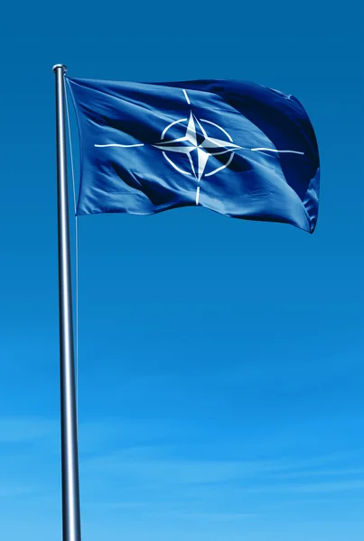 NATO flag waving on the wind — Stock Photo, Image